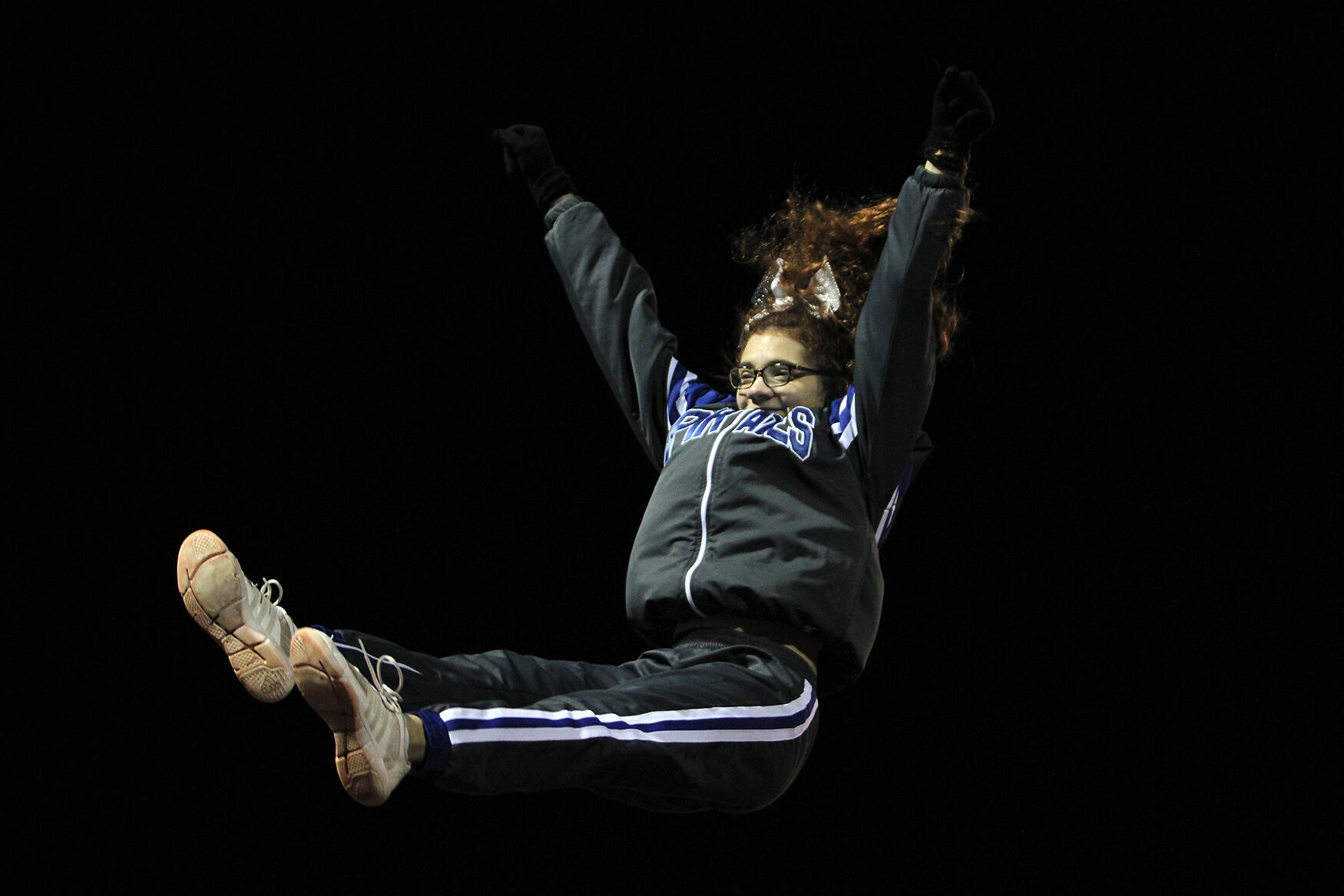 Cheerleader Stacia Fangman flies